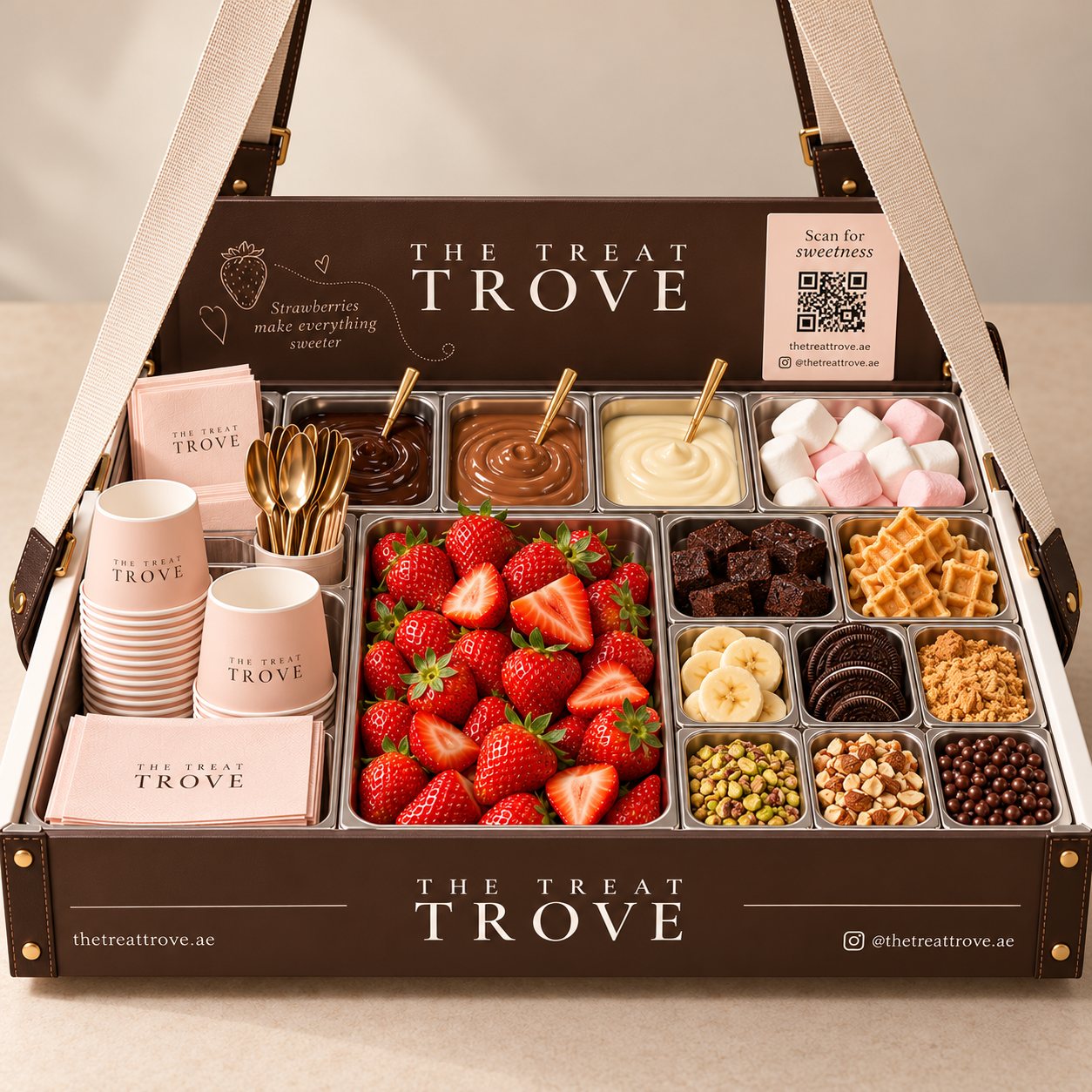 A Treat Trove serving tray featuring fresh strawberries, three varieties of dipping chocolate and an assortment of toppings.
